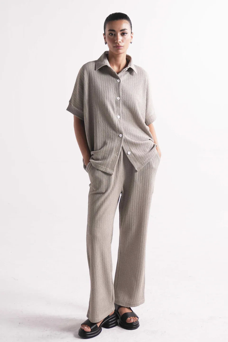 unique batwing sleeve design on beige button up shirt