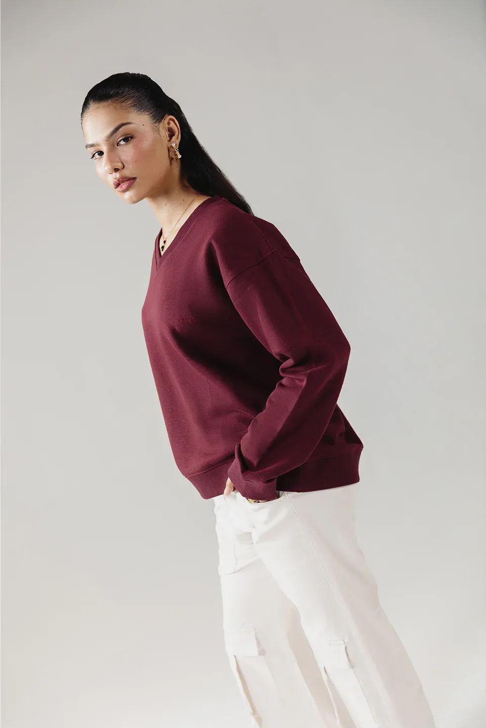 Comfortable beige cargo pants for women side pose