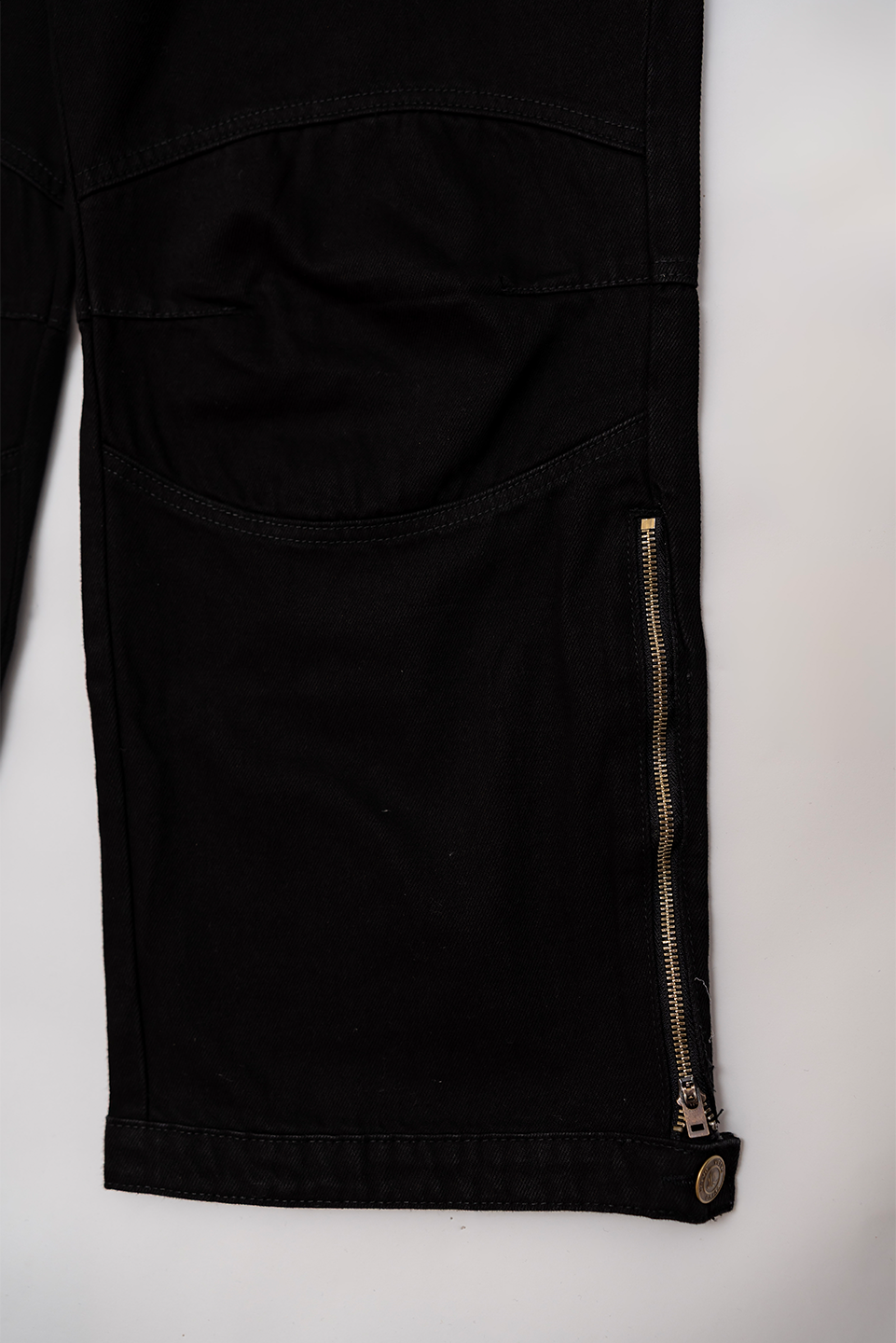 Unisex black wash cargo pants front leg view Pakistan