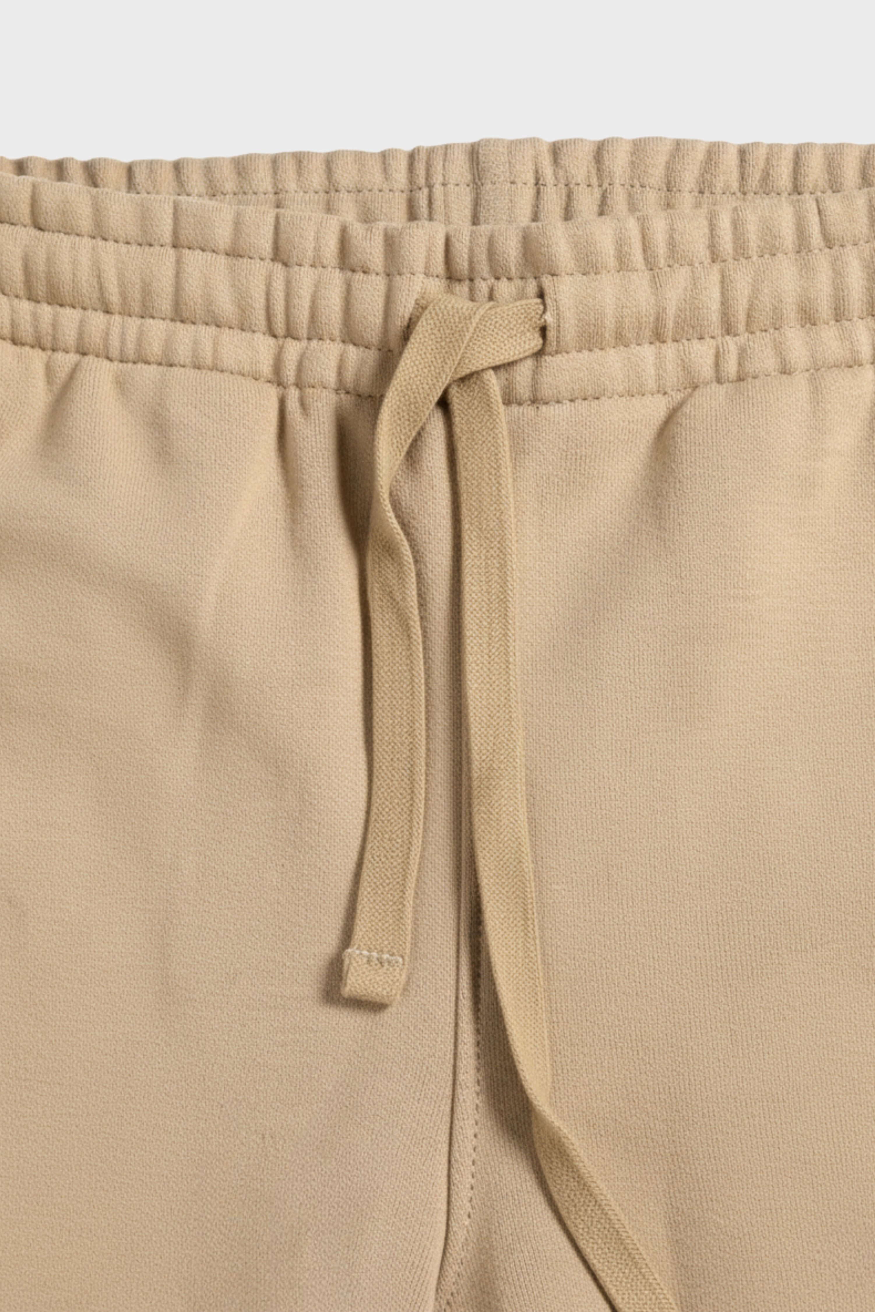 Winter trousers for men in Pakistan close up showing elastic waist and drawstring