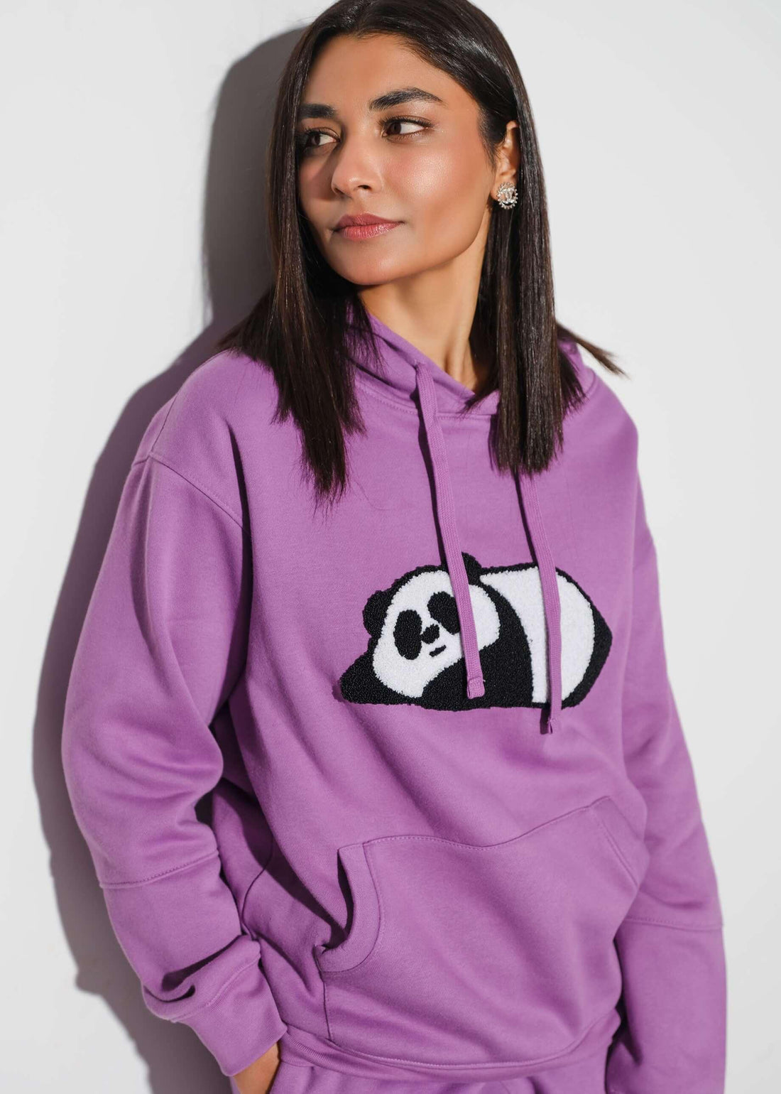 women wearing a drop shoulder hoodie by WearVerve in a casual style