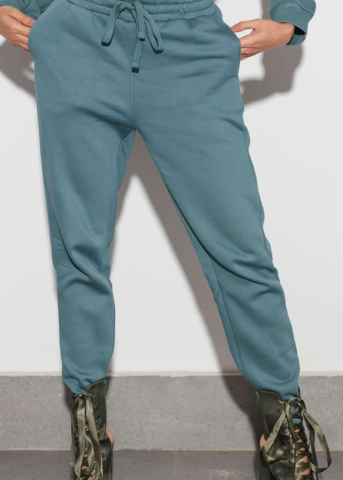 model wearing teal winter trousers for women - verve
