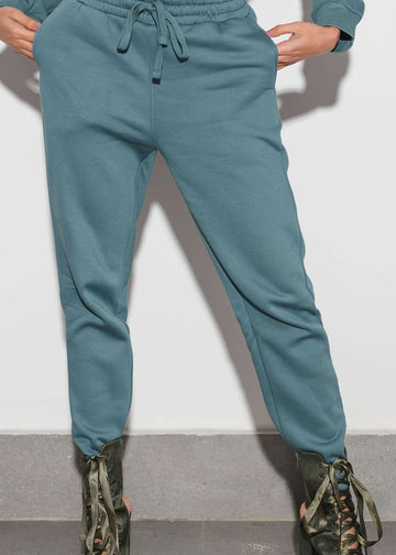 model wearing teal winter trousers for women - verve