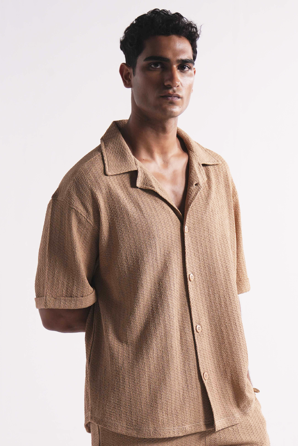 Beige Textured half sleeve button-up casual shirt for men.